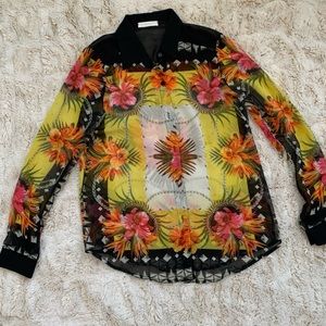 A totally sheer brilliant colored blouse.